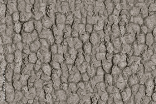 Texture of a stone wall with mortar and cement glue