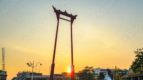 timelapse sunrise at Swing pillars in Bangkoksunrise at Swing pillars in Bangkok.Sao Chingcha is the architecture created for the ceremony of swinging in .the royal ceremony of the tri-yam  photo