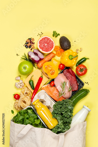 Grocery shopping concept - meat, fish, fruits and vegetables with shopping bag, top view