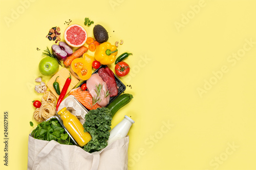 Grocery shopping concept - meat, fish, fruits and vegetables with shopping bag, top view