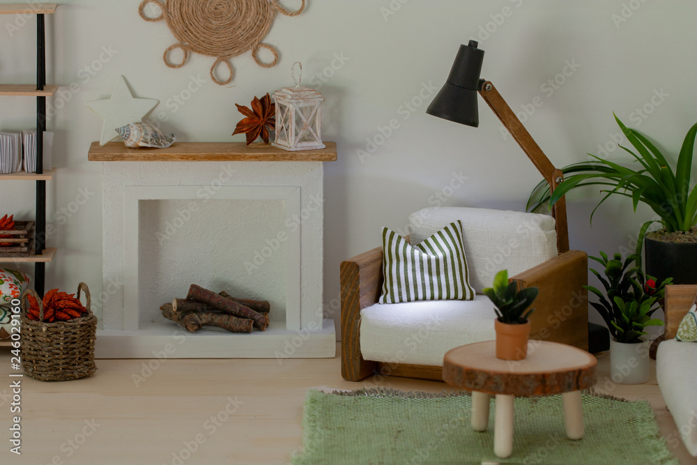 Φωτογραφία A cozy sitting place by a fireplace, an armchair and lampstand, Home comfort, calm and coziness