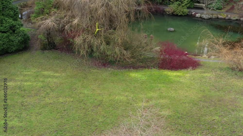 A perfect water landscape. Nice landscape with pond and rocks. Aerial drone view. 4K.