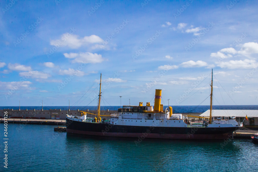 ship in the harbor of Santa Cruz de Tenerife with a blue sky with clouds