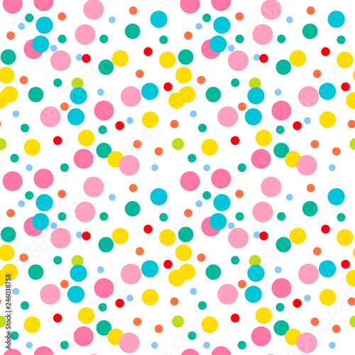Bright pink, yellow, green, blue, red messy dots on white background. Festive seamless pattern with round shapes. Grunge dotted texture for wrapping paper, web. Vector illustration.