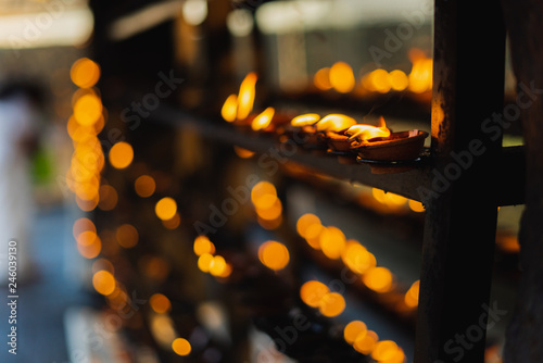 Coconut oil lamps in Hindu temple fire