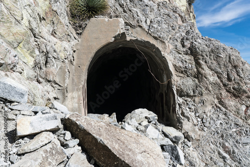 Partially collapsed entrance and rock slide damage at Mueller Tunnel in the San Gabriel Mountains and Angeles National Forest above Los Angeles, California.