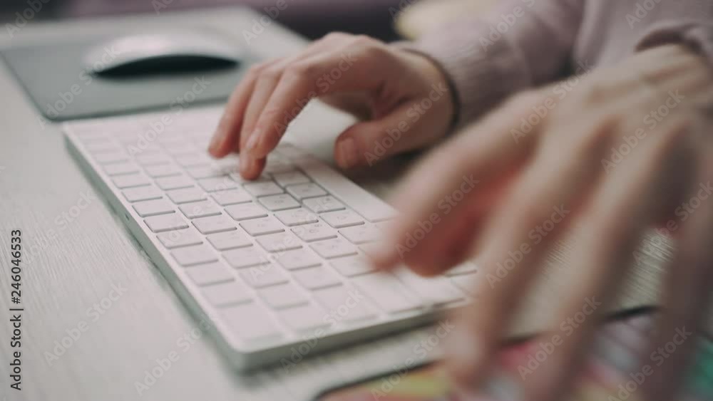 Typing hand holding mobile phone. Copyright worker. Office work concept Typing hand holding mobile phone. Copyright worker. Office work concept