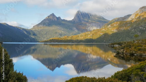 morning shot of cradle mountain reflected on a calm dove lake