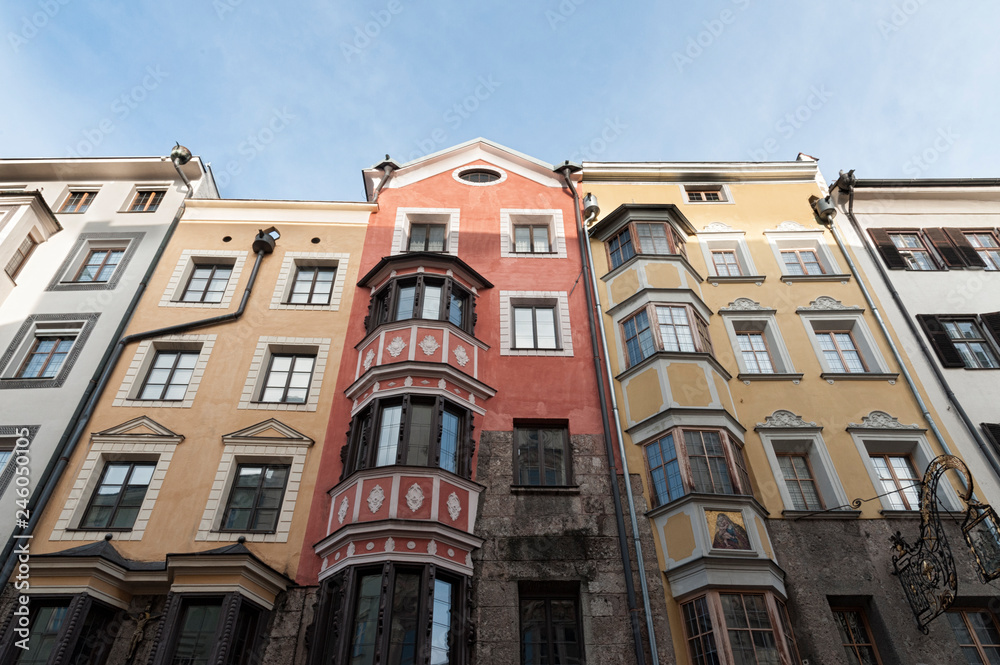 Fototapeta premium he ornate and colourful buildings of Herzog Friedrich-Strasse, in the Austrian Alpine town of Innsbruck