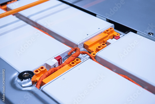 EV car battery pack. Electric car lithium battery pack. Blue toned. Car maintenance.