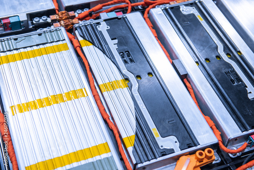 EV car battery pack. Electric car lithium battery pack. Blue toned. Car maintenance.