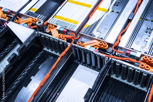 EV car battery pack. Electric car lithium battery pack. Blue toned. Car maintenance.