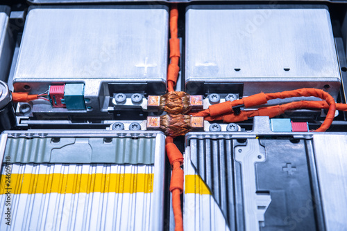 EV car battery pack. Electric car lithium battery pack. Blue toned. Car maintenance.