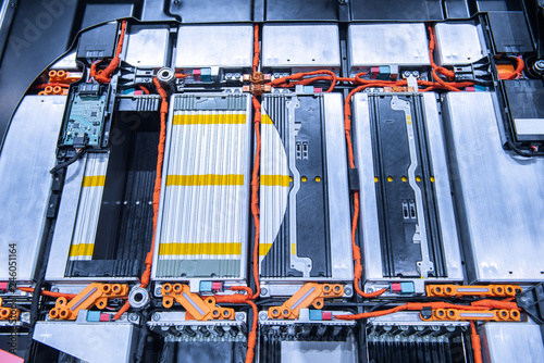 EV car battery pack. Electric car lithium battery pack. Blue toned. Car maintenance.