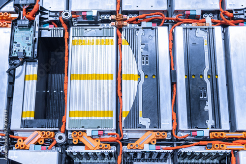 EV car battery pack. Electric car lithium battery pack. Blue toned. Car maintenance.