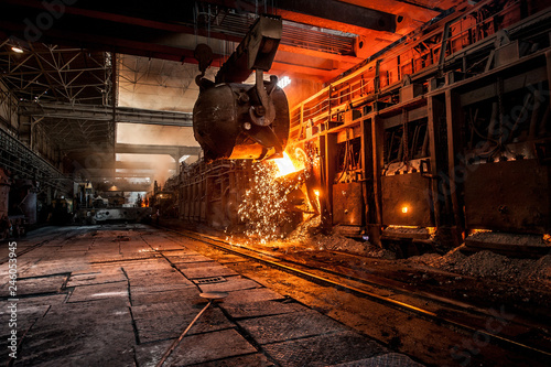Pouring of liquid metal in open-hearth furnace