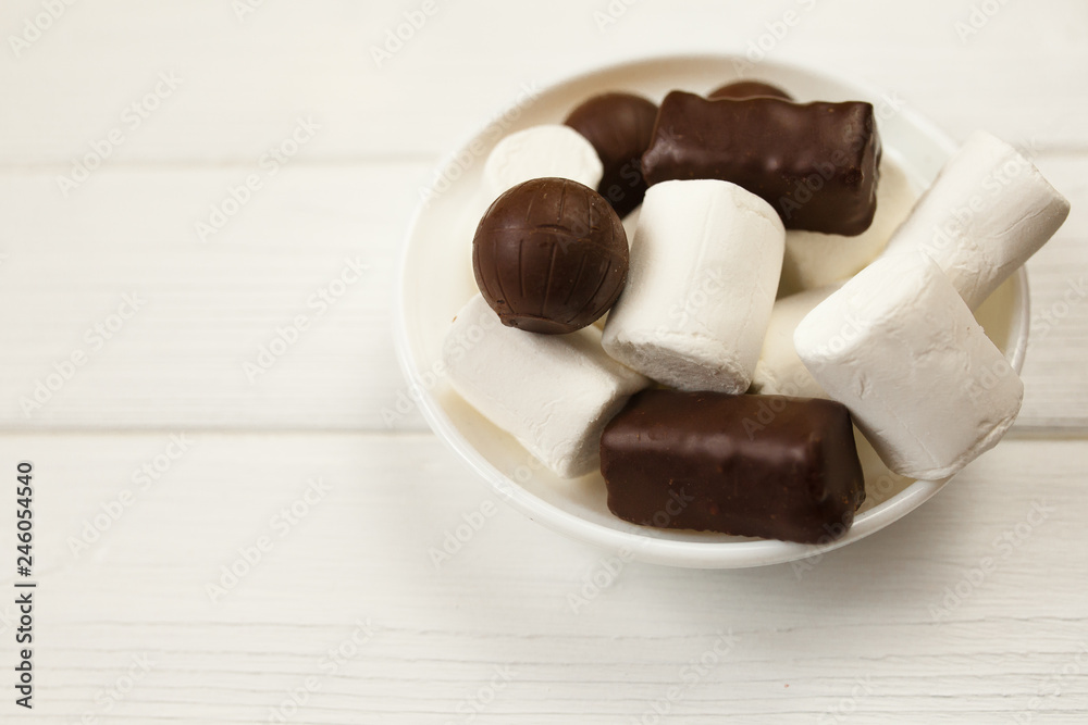 top view of various chocolate pralines isolated on white background top view of various chocolate pralines isolated on white background