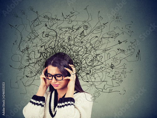 Photography Thoughtful stressed young woman in glasses with a mess in her head