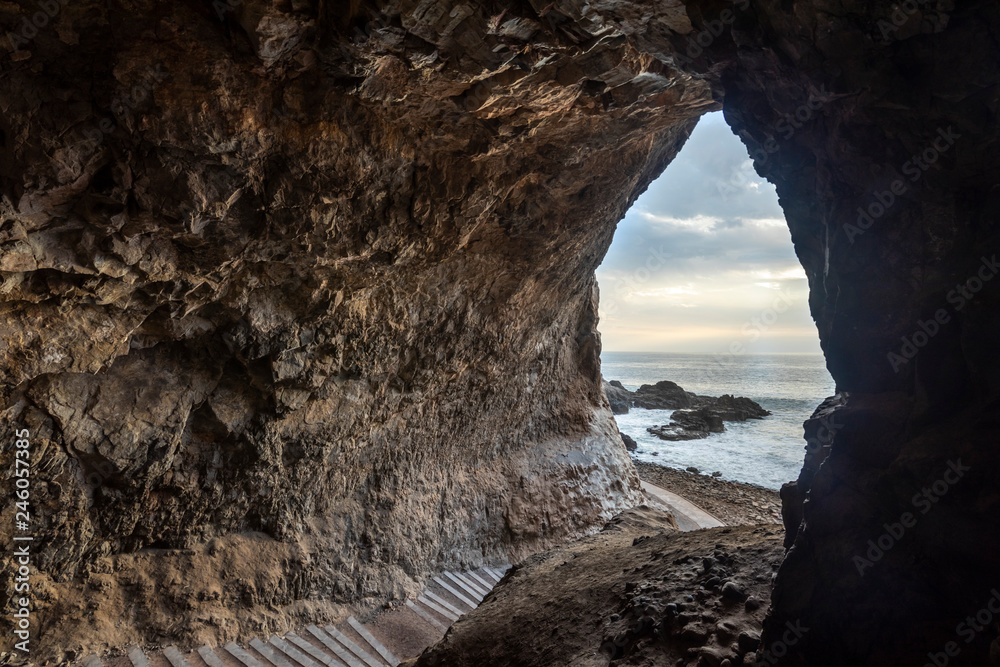 The famous travel destination of Cuevas de Anzota (Anzota Caves). Amazing cliff walk over Pacific Ocean waters with awe caves with huge windows over the sea. A wonderful and fantasy landscape