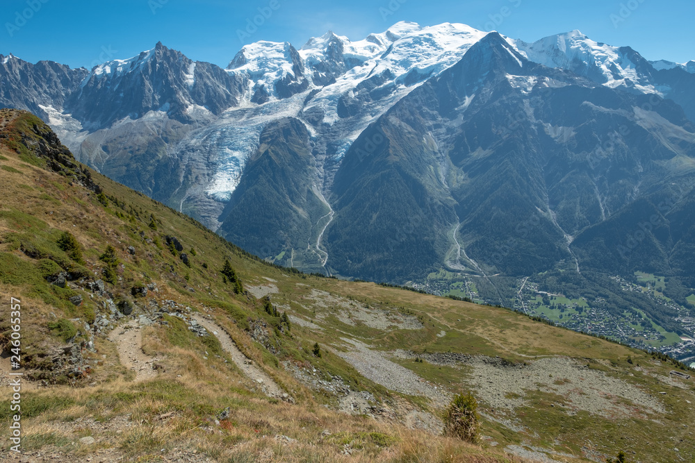 Footpath meanders downhill in foreground with views of Mont Blanc