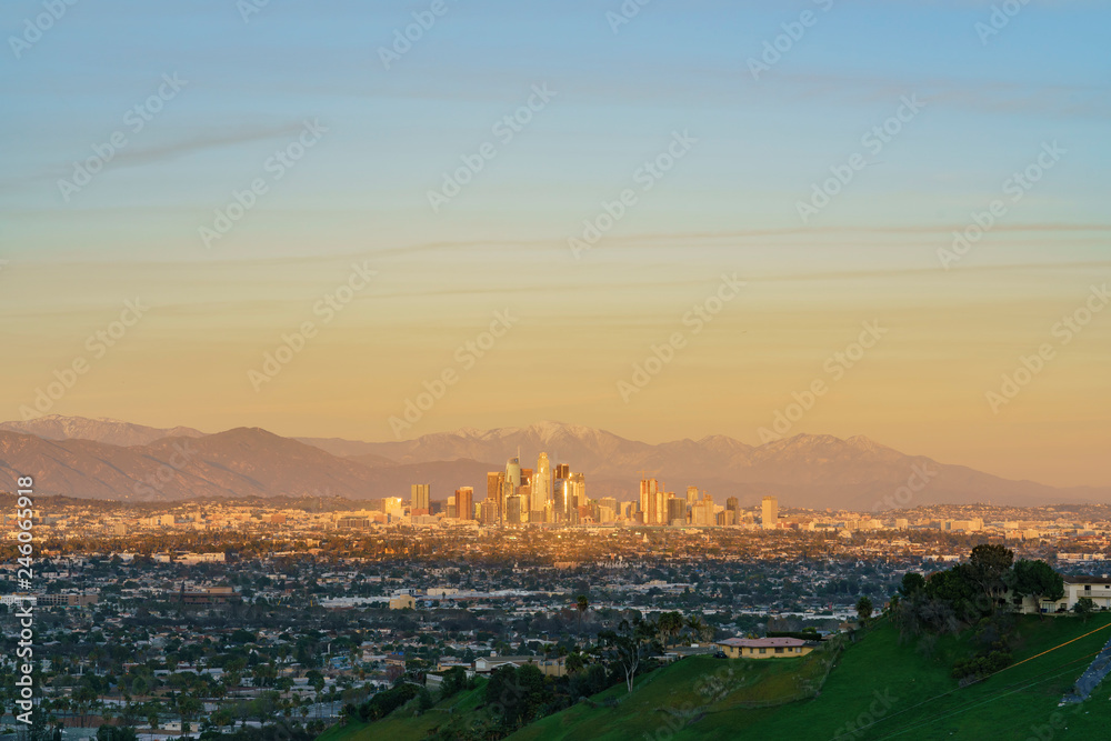 Sunset aerial view of the beautiful Los Angeles downtown cityscape with mt. Baldy