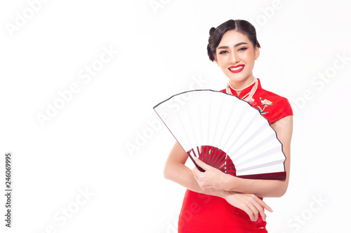Fotografie Charming beautiful Chinese woman wear chinese dress or cheongsam and pearl necklace with smiley face