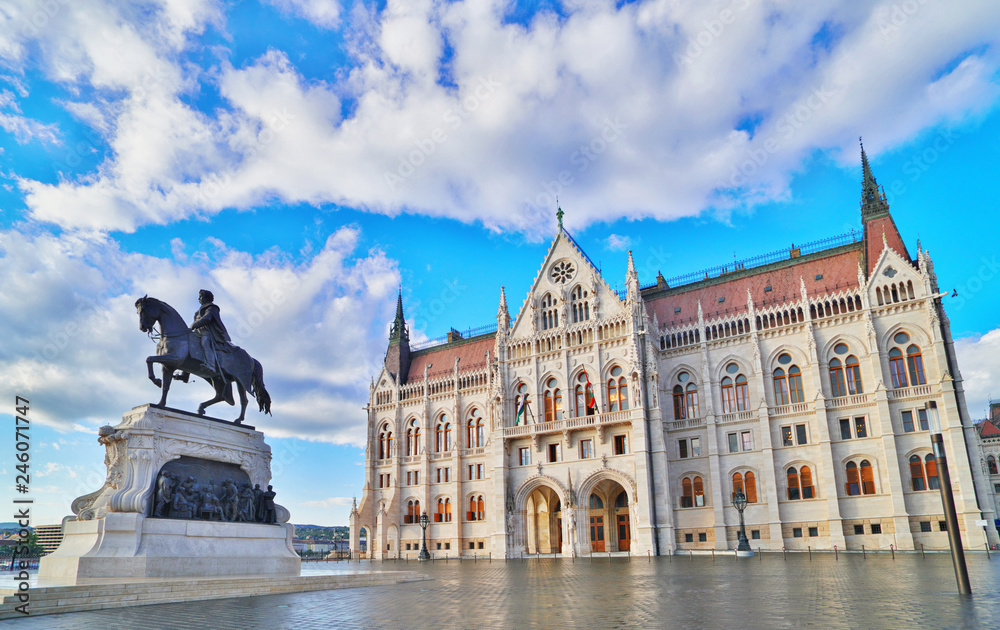 Budapest, Hungary. Statue of Count Gyula Andrassy on the Parliament Square in front of Beautiful building of Hungarian Parliament in Budapest, popular Europe travel destination.