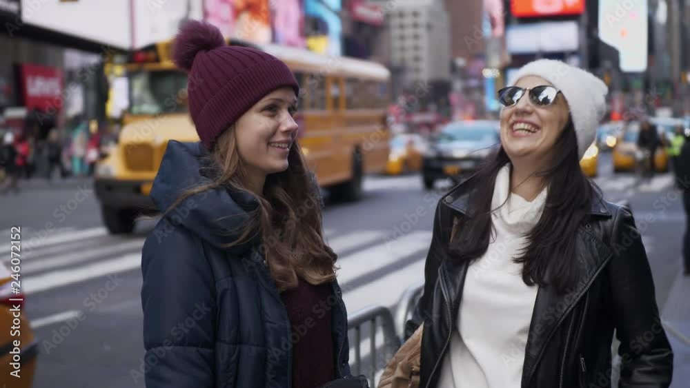 Two friends enjoy their vacation trip to New York Two friends enjoy their vacation trip to New York