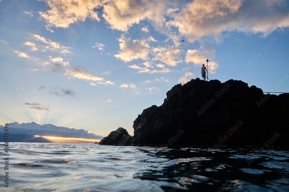 Hawaii people jumping into ocean from Black rock Ka'anapali