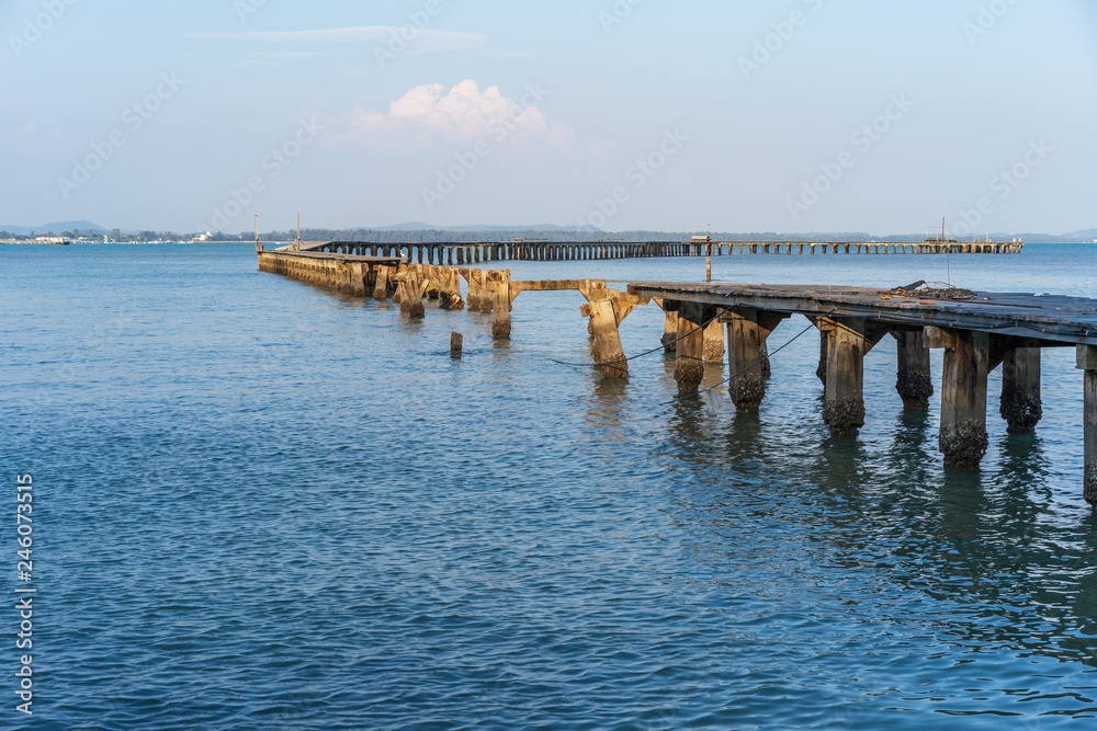 broken wooden bridge to sea (damage from storm) at Rayong,Thailand