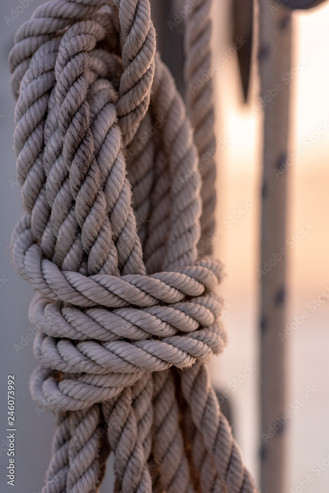 closeup of rope on mast of sailboat