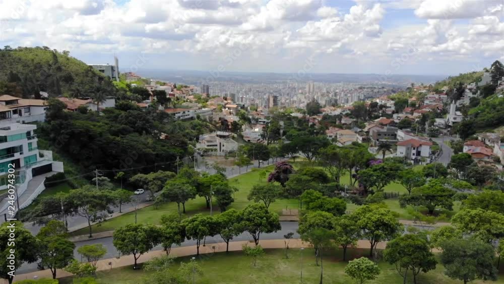 A Beautiful cityscape behind a park in Brazil - Aerial View - Dolly - Right A Beautiful cityscape behind a park in Brazil - Aerial View - Dolly - Right