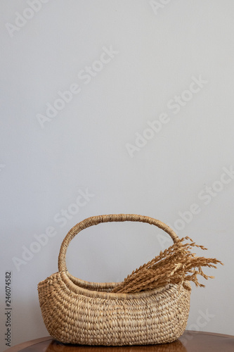 rice in basketry isolated on gray background. concept for traditional hand craft