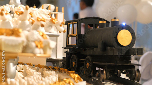 Decoration with a little train carrying candy