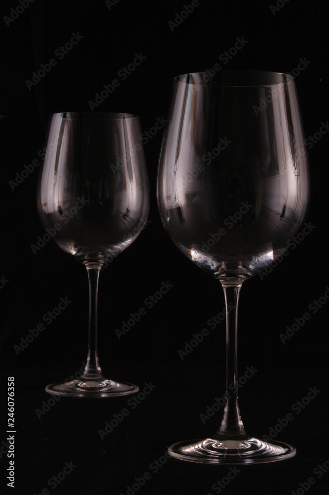 Glass cup on black background