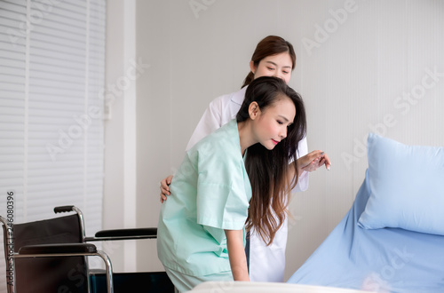 Doctor support to her patients asian woman practice physical therapy in hospital,Healthcare encouragement concept photo