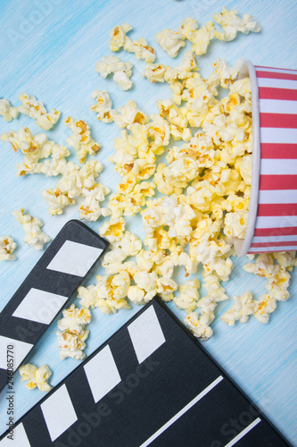 scattered popcorn and double for shooting, on a light background
