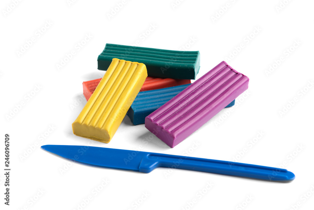 Colored plasticine isolated on white background. Colored plasticine isolated on white background.
