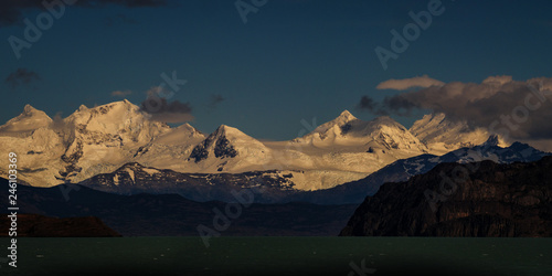 patagonian andes mountains from azure alpine lake