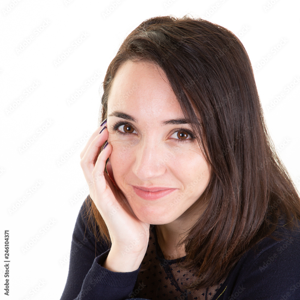 Woman brunette hair beauty portrait studio isolated on white hands on chin Woman brunette hair beauty portrait studio isolated on white hands on chin
