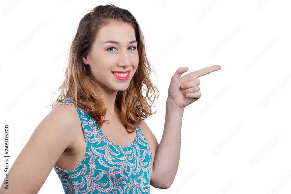 young attractive woman pointing with her finger on copyspace young attractive woman pointing with her finger on copyspace