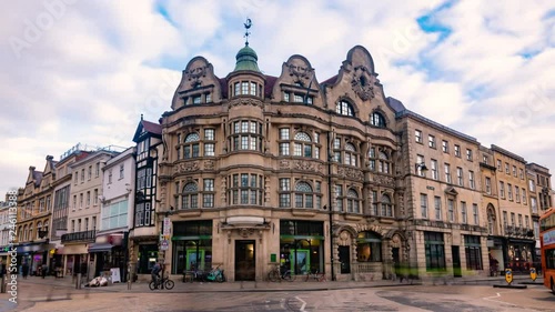 Time lapse zoom out view of Oxford high street crossroad with Cornmarket photo