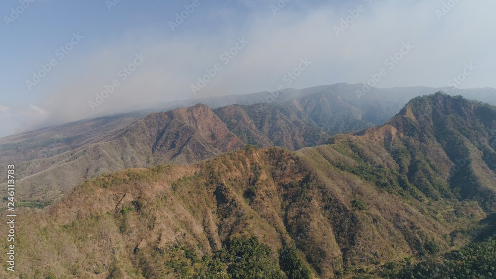 aerial view mountain landscape mountain range with high cliffs. Mountains covered with trees and vegetation. tropical landscape