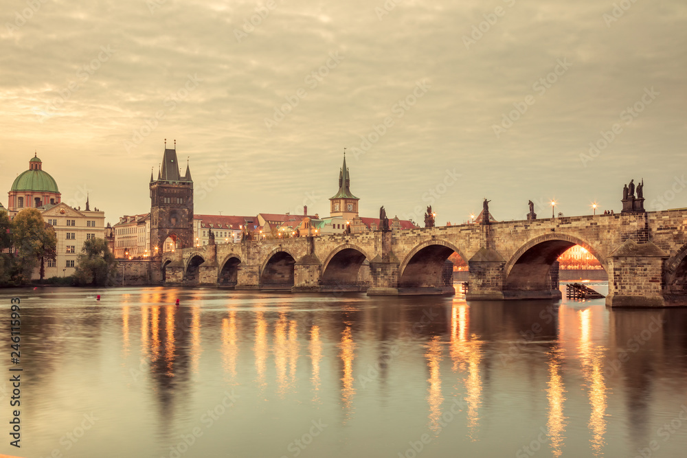 Vintage Prague Landmarks - towers and bridge at light night
