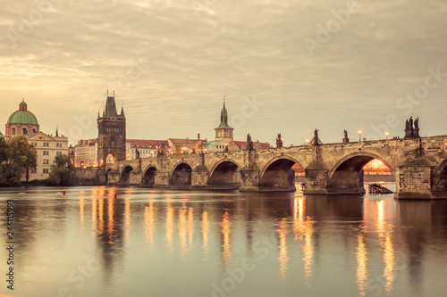 Vintage Prague Landmarks - towers and bridge at light night © Taiga