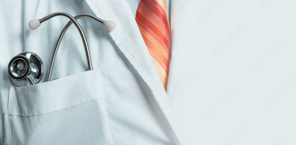 Medicine, Healthcare, Insurance Concept. Doctor with stethoscope, closeup with copy-space