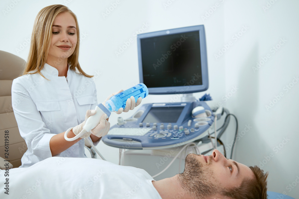 Fototapeta premium Portrait of man and nurse working with patient.
