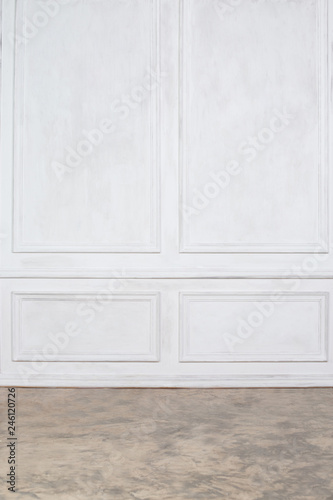 Empty interior with white wall panels