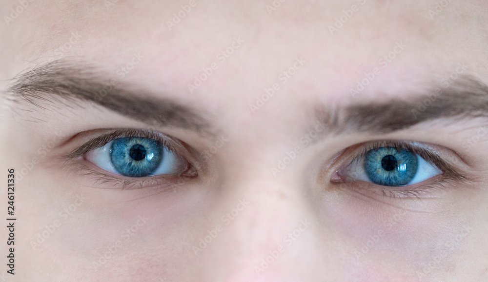 bright blue eyes teen blonde close-up Stock Photo