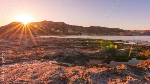 Seaside sunset over mountains in Cabo de Gata, Almer√≠a photo